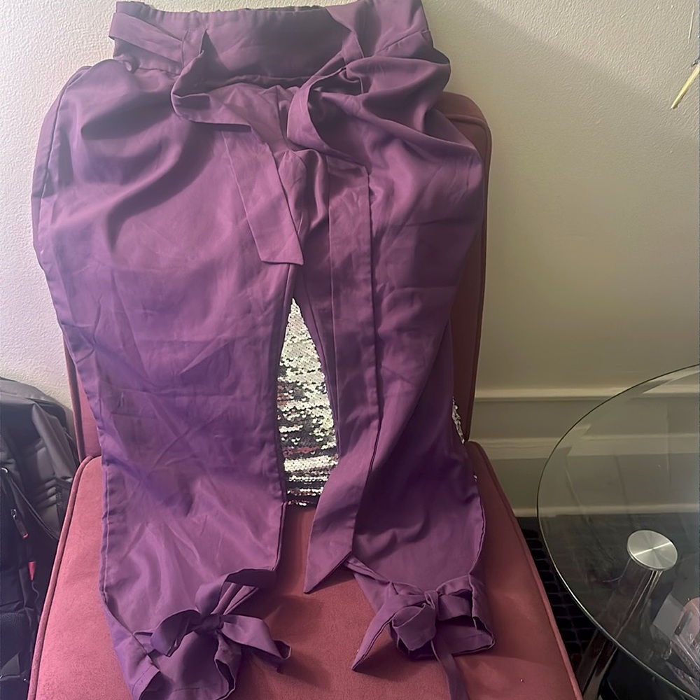 Purple pants with elastic waist and belt! Cute detail: ties up at the bottom!